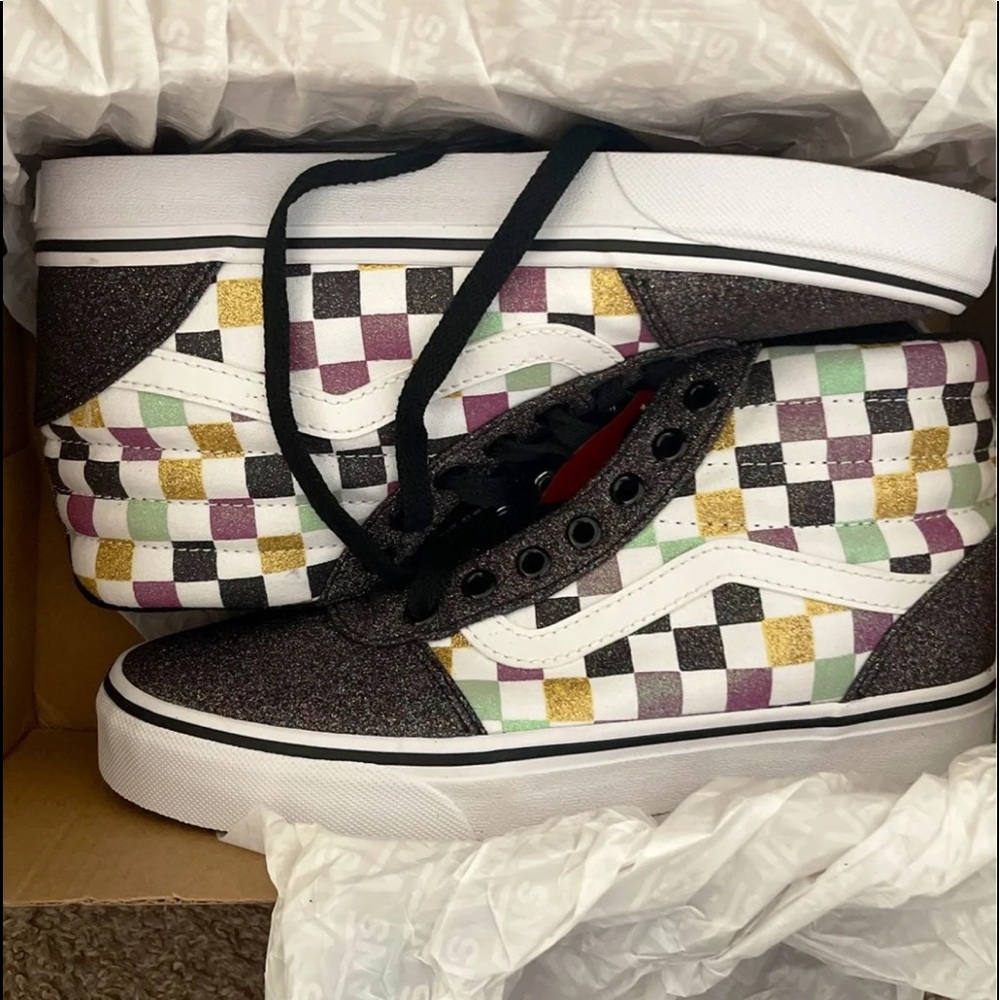 Black high top glitter vans
